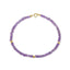A faceted beaded gemstone bracelet with three gold bead accents and lobster clasp. Available in twelve natural gemstones.