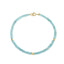 A faceted beaded gemstone bracelet with three gold bead accents and lobster clasp. Available in twelve natural gemstones.