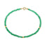 A faceted beaded gemstone bracelet with three gold bead accents and lobster clasp. Available in twelve natural gemstones.