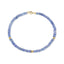 A faceted beaded gemstone bracelet with three gold bead accents and lobster clasp. Available in twelve natural gemstones.