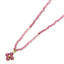 A faceted beaded necklace with a solid gold flower pendant attached. available in amethyst or pink tourmaline.