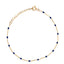 A dainty chain bracelet with beaded color enamel stations. Made with adjustment links.