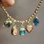 Showing a array of fancy shaped colored diamond including heart, pear and emerald cuts.