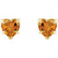 Heart-shaped orange gemstone earrings on a white background