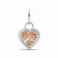 A heart shaped pink diamond pendant bezel set with ribbed edges and a oval bail.