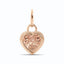 A heart shaped pink diamond pendant bezel set with ribbed edges and a oval bail.