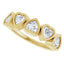 Gold ring with heart-shaped diamond stones on a white background