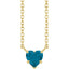 Gold necklace with a heart-shaped blue gemstone on a white background