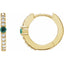Gold hoop earrings with emerald and diamond accents on a white background