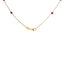 A solid gold station necklace with beaded gemstones evenly spaced out. Clasp
