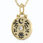 A beautiful coin charm with moon, lotus and flower vine designs, very detailed antique finish. With a round center diamond and carved stars.