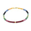A faceted gemstone ombre beaded bracelet with three gold accents and a round clasp.
