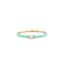 A thin band with colorful enamel and a center baguette stone. This ring is dainty and feminine.