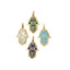 A hamsa charm with laced design overlaying colored gemstone. Solid 14k gold.