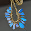 Showing a selection of beautiful blue boulder opals bezel set in solid gold. Each opal is one of a kind with incredible fire and pattern.