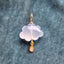 A storm cloud pendant with a hand carved gemstone and a solid gold charm attached at the bottom of the cloud.