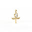 Gold pendant with a central gemstone on a white background
