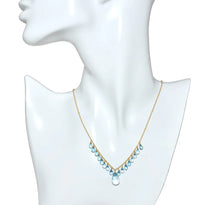 Necklace with blue beads on a mannequin bust