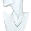 Necklace with blue beads on a mannequin bust
