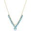 Necklace with blue teardrop-shaped gemstones on a gold chain against a white background