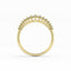 Gold ring with a decorative band on a white background
