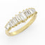 Gold ring with emerald-cut diamonds on a white background