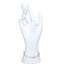 White mannequin hand wearing a gold bracelet with blue and red beads on a white background