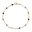 Multicolored beaded bracelet on a gold chain with a white background