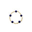 Gold bracelet with blue beads on a white background