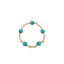 Gold bracelet with turquoise beads on a white background