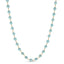 A blue gemstone beaded station necklace with yellow gold.