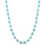 A blue gemstone beaded station necklace with yellow gold.