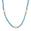 A faceted blue topaz beaded gemstone necklace with three pearls set evenly spaced in the front. Finished with a pear clasp. 