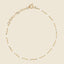 A dainty chain bracelet with beaded color enamel stations. Made with adjustment links. 