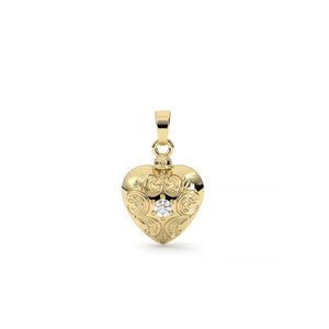 Gold heart-shaped pendant with a diamond on a white background