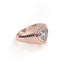 Rose gold ring with a diamond on a white background