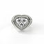 Heart-shaped diamond ring with a white background