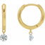Gold hoop earrings with gemstone drops on a white background