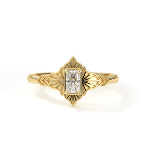 Gold ring with a diamond on a white background