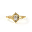 Gold ring with a diamond on a white background