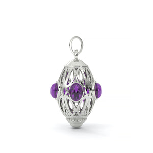 Silver pendant with purple gemstones on a white background