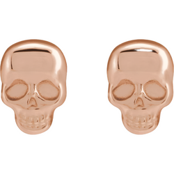 A pair of earring studs that has a three dimensional skulls. Sold in single or pairs. 