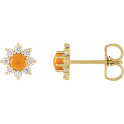 Gold earrings with orange center and diamond-like stones on a white background