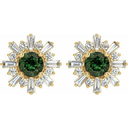 Gold earrings with green gemstones and clear stones on a white background