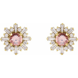 Pair of earrings with pink gemstones and gold and diamond accents on a white background
