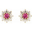 Pair of earrings with pink gemstones and gold and diamond accents on a white background