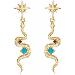 Gold snake-shaped earrings with star tops and gemstones on a white background