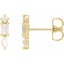 Gold earrings with clear gemstones on a white background