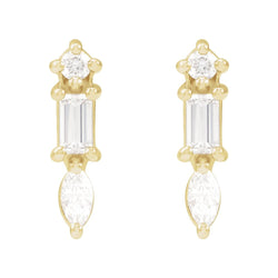Gold earrings with clear gemstones on a white background
