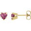 Gold earrings with pink heart-shaped gemstones on a white background